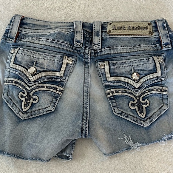 Rock Revival Pants - ROCK REVIVAL Raven Distressed Embellished Pocket Jean Cut-off Shorts Denim Sz 27